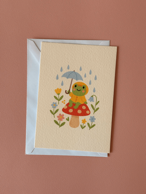 Wenskaart Rainy Day Frog Charms Of Chapters