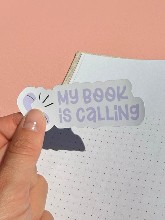 My Book Is Calling sticker van Charms of Chapters als bookish goodie.