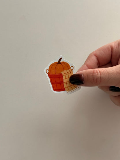 Pumpkin Basket herfststicker van Charms of Chapters als cozy bookish goodie.